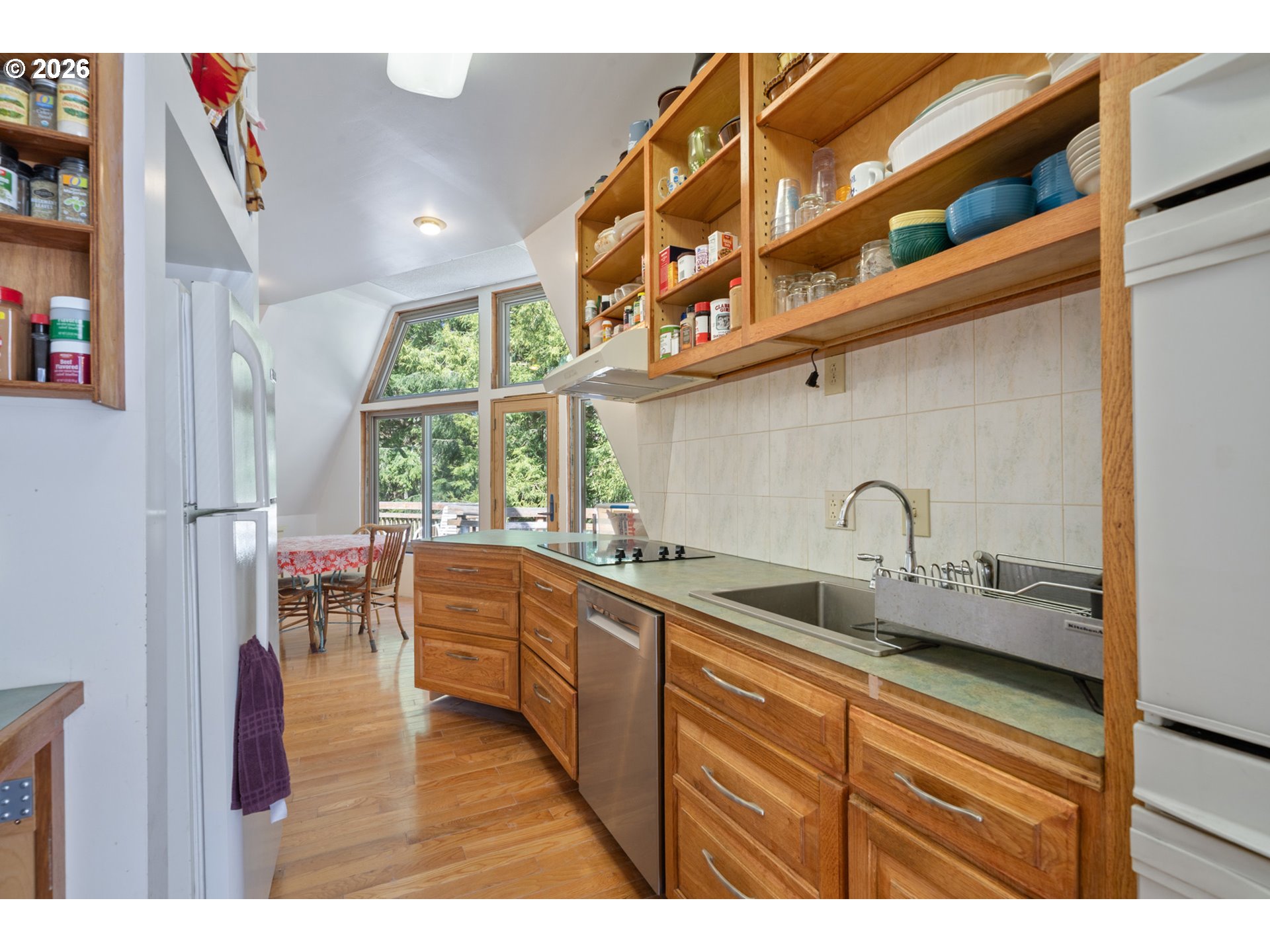 2500 Whiskey Creek Road Tillamook, OR 97141 - Photo 30 of 46 a kitchen with a sink and cabinets