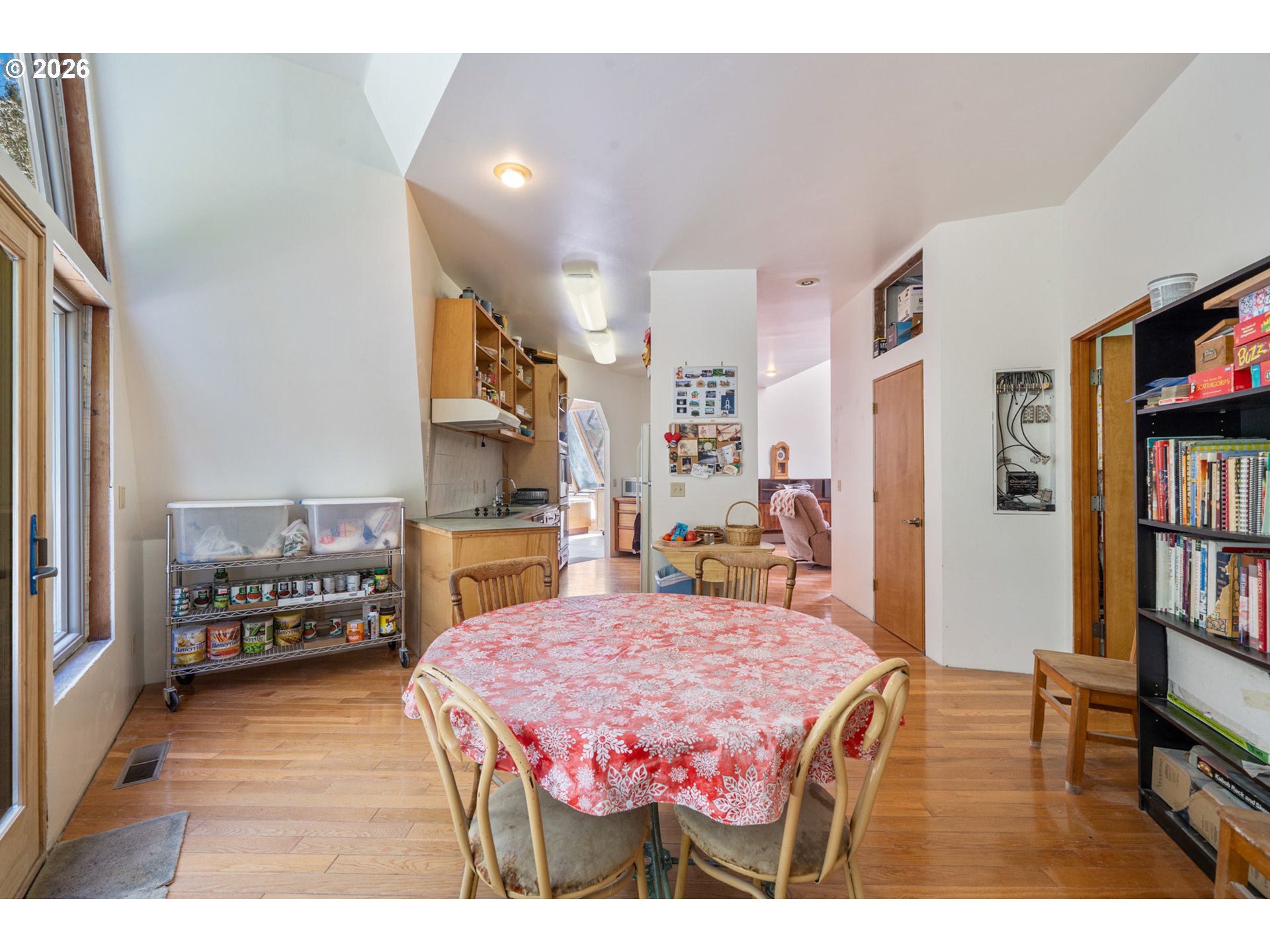 2500 Whiskey Creek Road Tillamook, OR 97141 - Photo 31 of 46 a bedroom with a bed and a book shelf