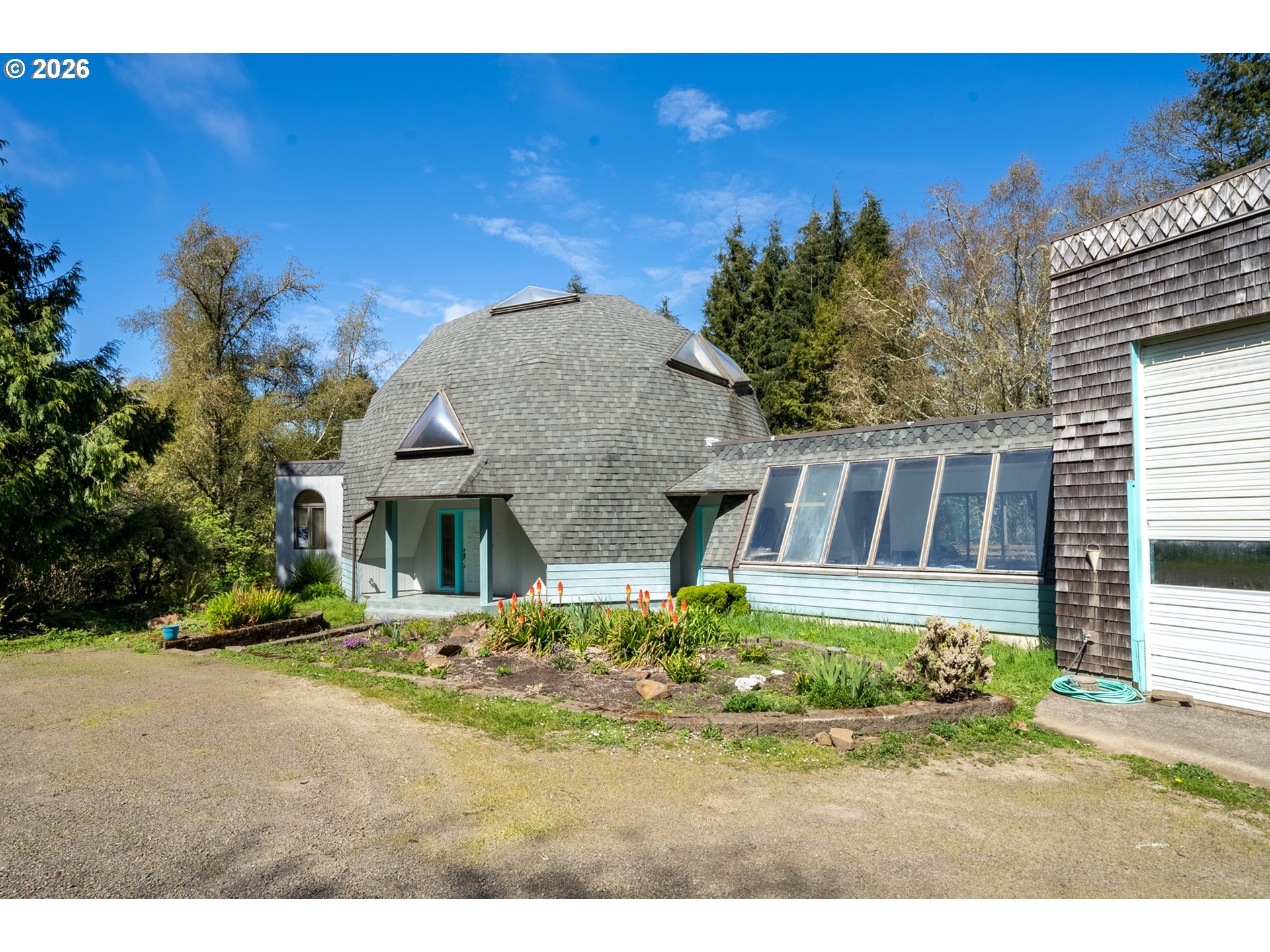 2500 Whiskey Creek Road Tillamook, OR 97141 - Photo 4 of 46 a front view of a house with a yard