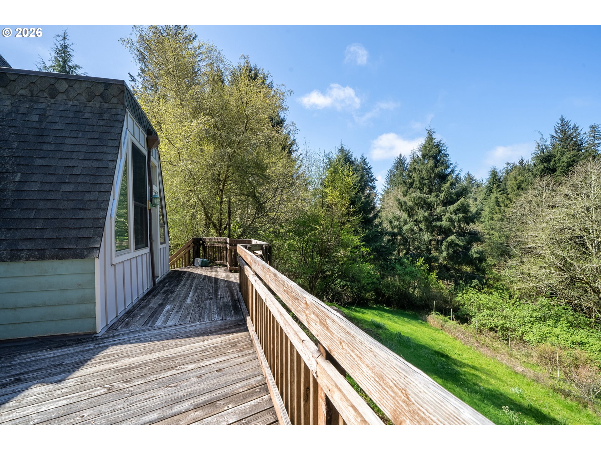 2500 Whiskey Creek Road Tillamook, OR 97141 - Photo 46 of 46 a view of balcony with wooden floor and fence