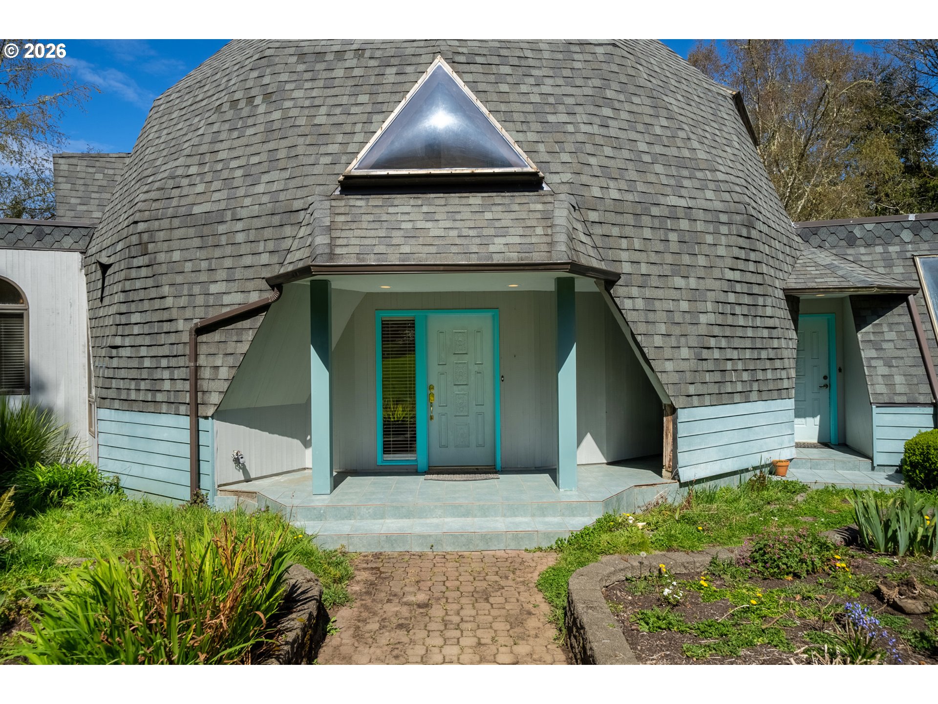 2500 Whiskey Creek Road Tillamook, OR 97141 - Photo 7 of 46 a front view of a house with a yard and garage