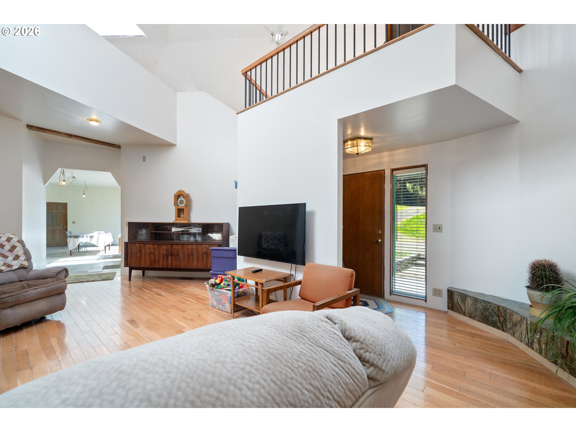 2500 Whiskey Creek Road Tillamook, OR 97141 - Photo 8 of 46 a living room with furniture and a flat screen tv