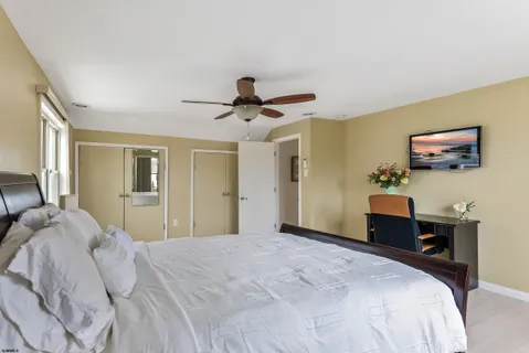 a view of a patio with chair and white walls