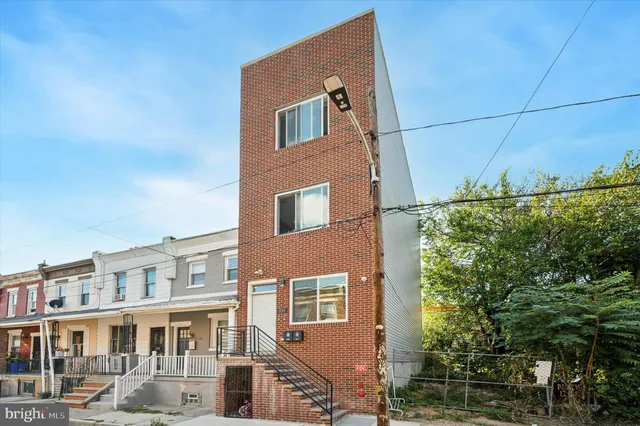 a front view of a building with balcony