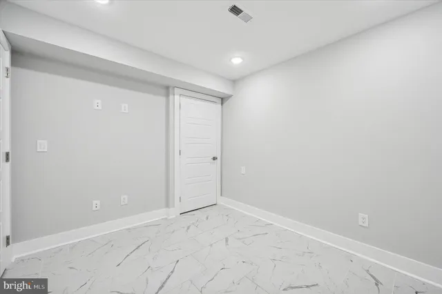 an empty room with an entryway