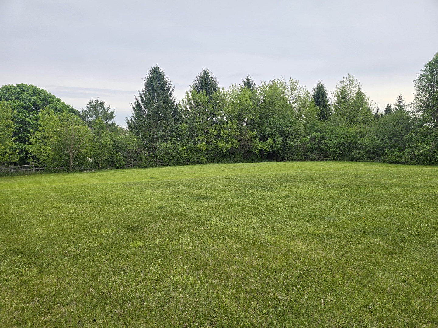 5 Springbrook Lane Algonquin, IL 60102 - Photo 3 of 4 a view of a field with trees in the background