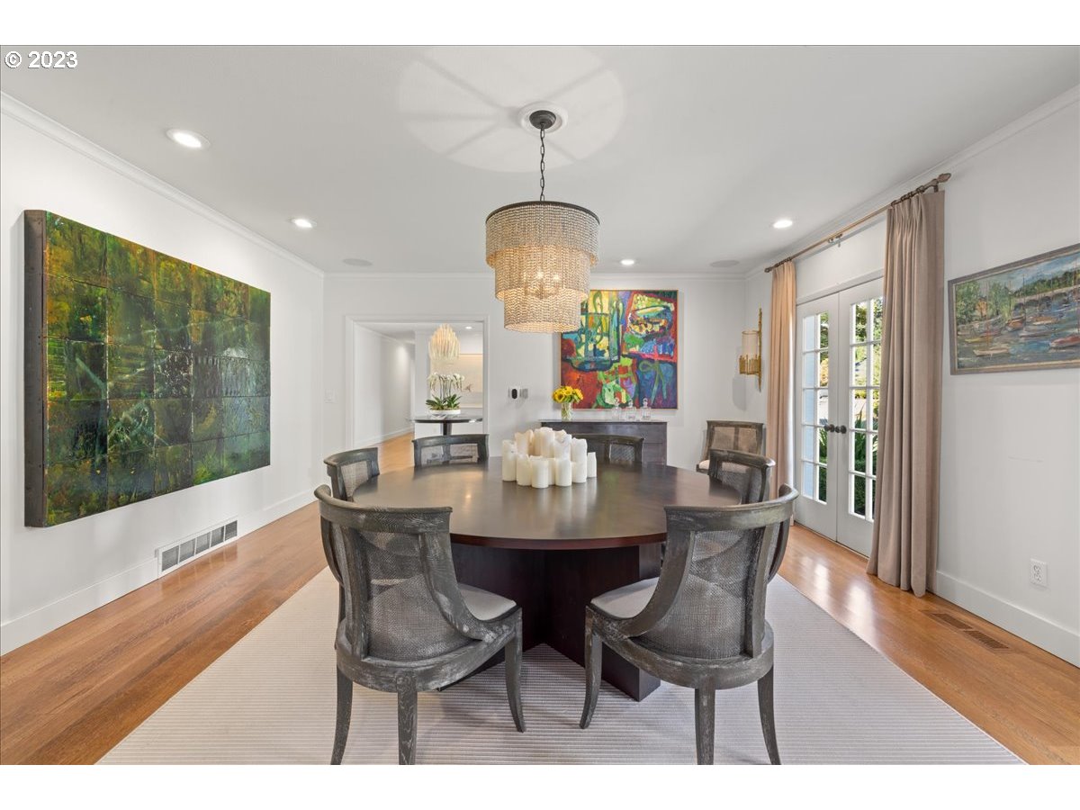 7470 Southwest Westgate Way Portland, OR 97225 - Photo 11 of 41 a view of a dining room with furniture window and wooden floor