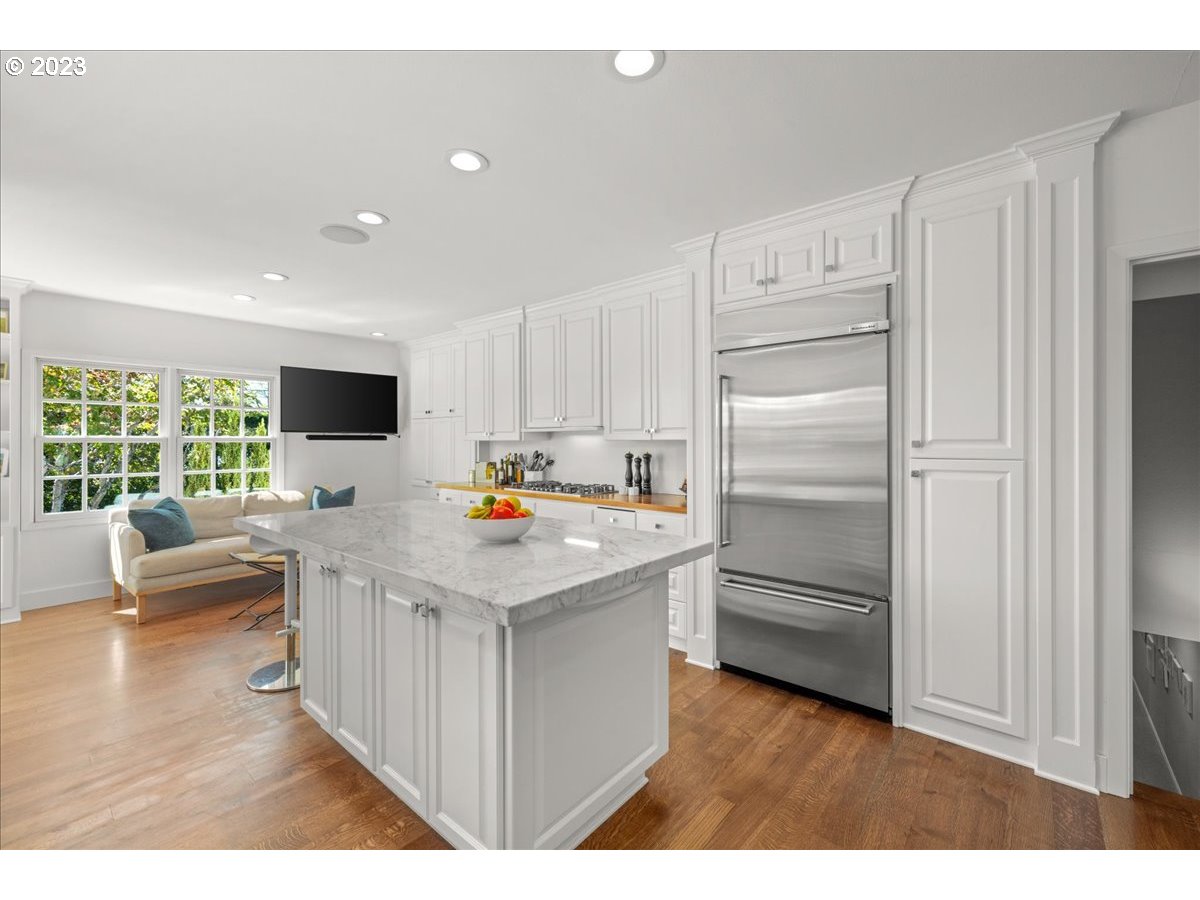 7470 Southwest Westgate Way Portland, OR 97225 - Photo 16 of 41 a kitchen with a refrigerator sink and cabinets