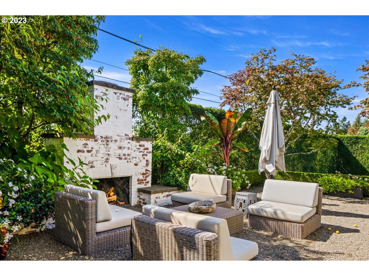 7470 Southwest Westgate Way Portland, OR 97225 - Photo 23 of 41 a view of a patio with couches table and chairs and potted plants