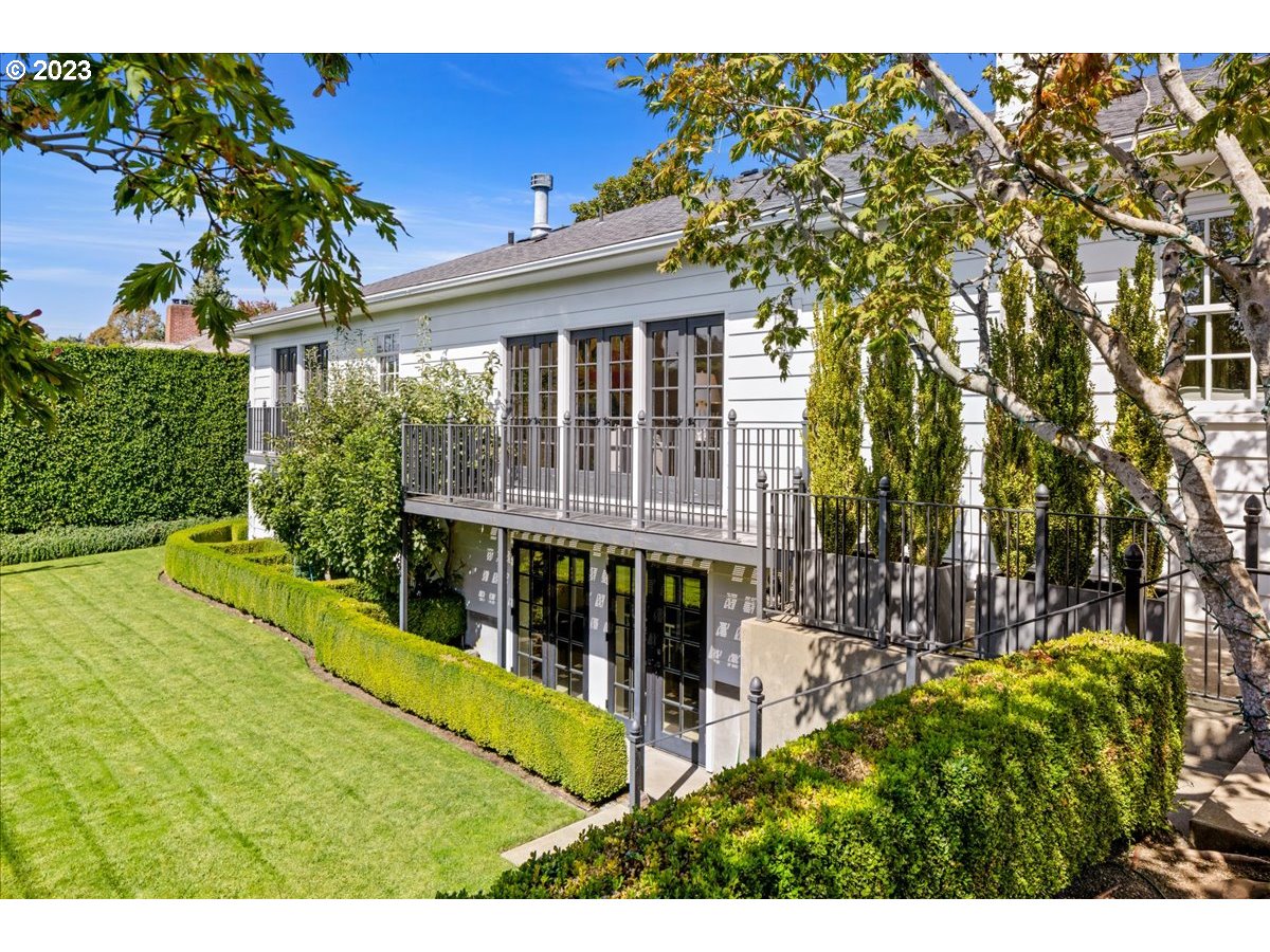 7470 Southwest Westgate Way Portland, OR 97225 - Photo 24 of 41 a view of an house with backyard space and garden