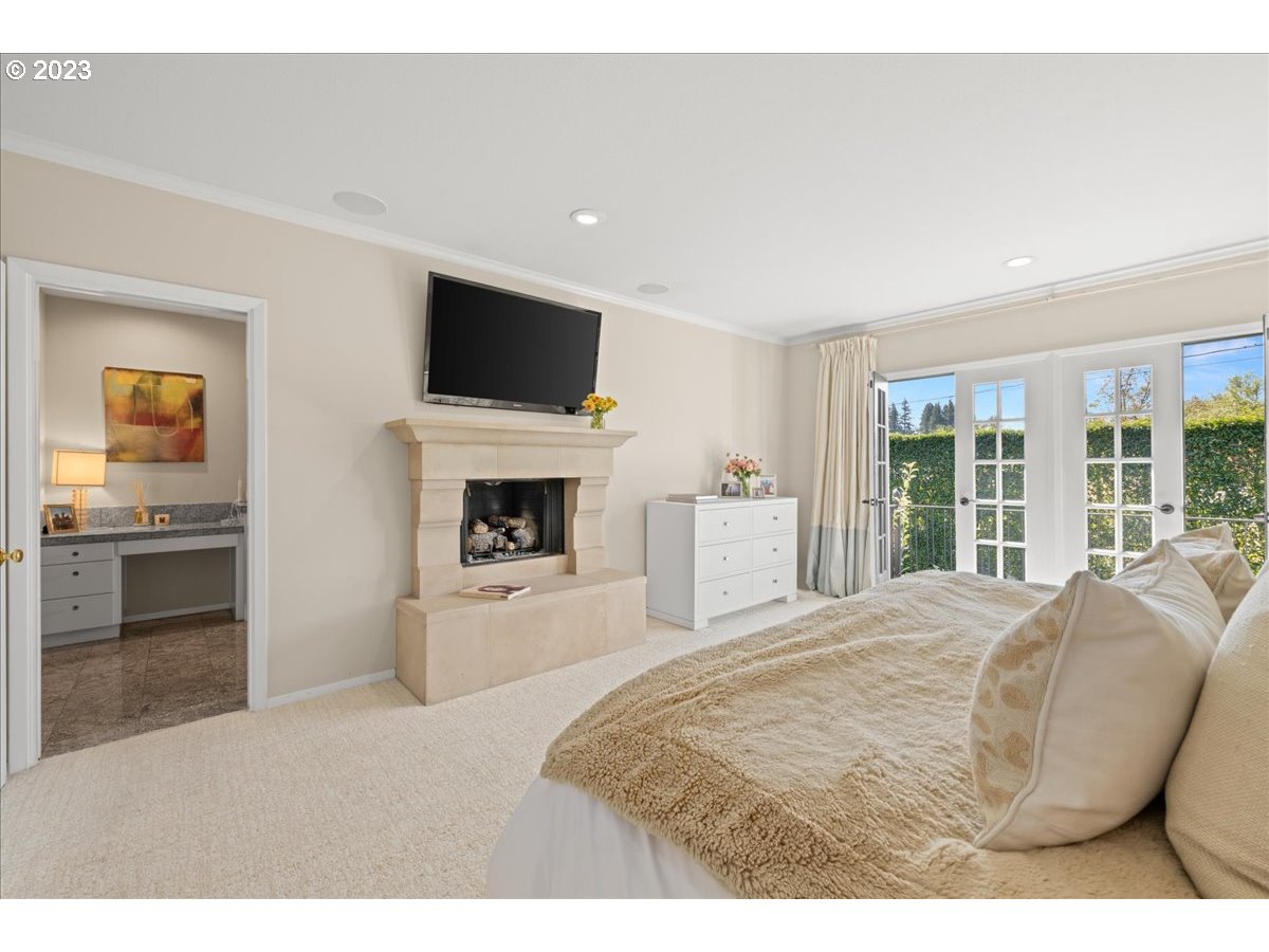 7470 Southwest Westgate Way Portland, OR 97225 - Photo 26 of 41 a bedroom with a bed and a television