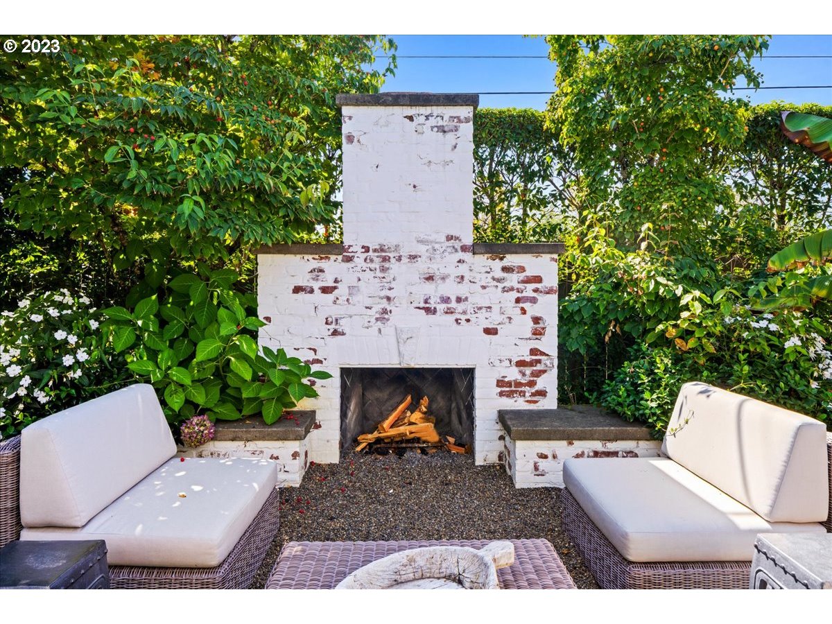 7470 Southwest Westgate Way Portland, OR 97225 - Photo 36 of 41 an aerial view of a house with yard fireplace and outdoor seating