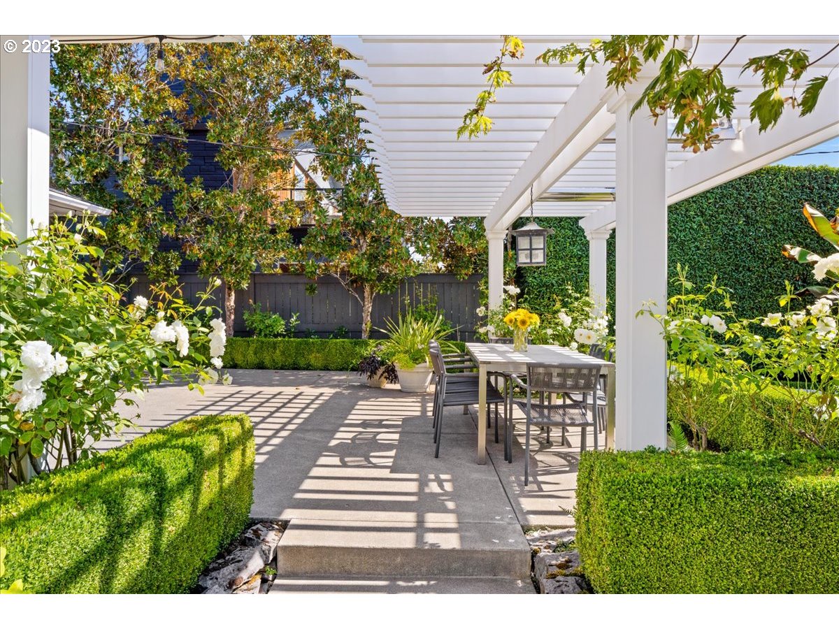7470 Southwest Westgate Way Portland, OR 97225 - Photo 37 of 41 a front view of a house with garden