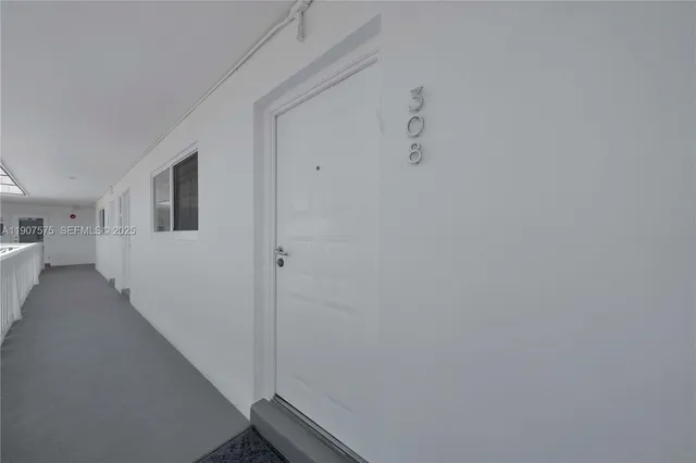 a view of a hallway with closet