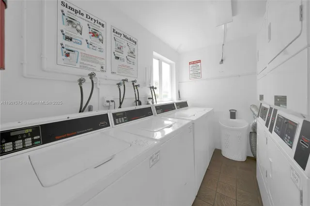 a bathroom with a sink a toilet and a shower