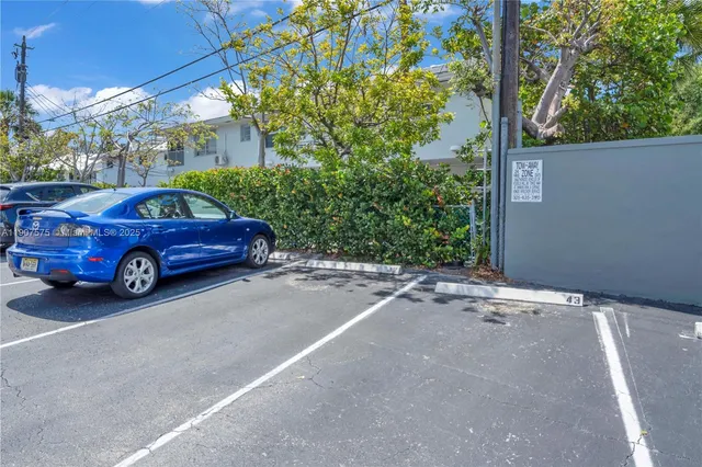 a car parked in front of a building