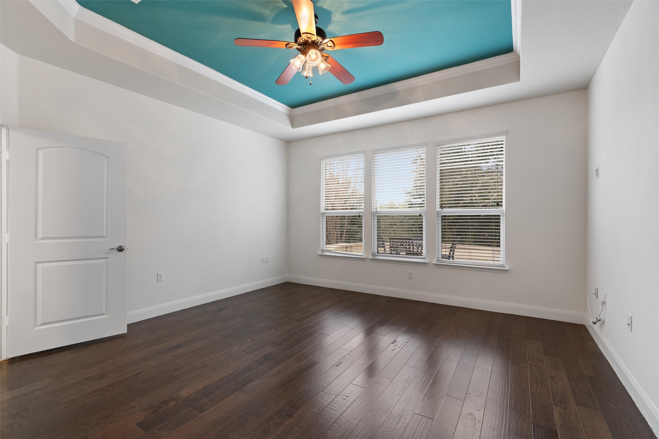 706 Kite Ridge Street Georgetown, TX 78633 - Photo 19 of 37 wooden floor in an empty room with a window