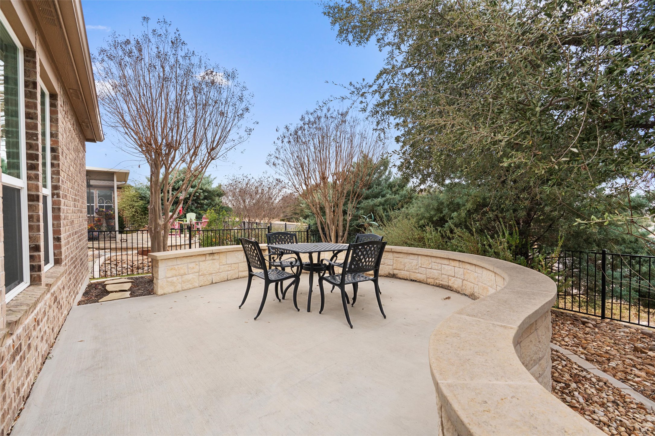 706 Kite Ridge Street Georgetown, TX 78633 - Photo 31 of 37 a view of a patio with table and chairs and potted plants