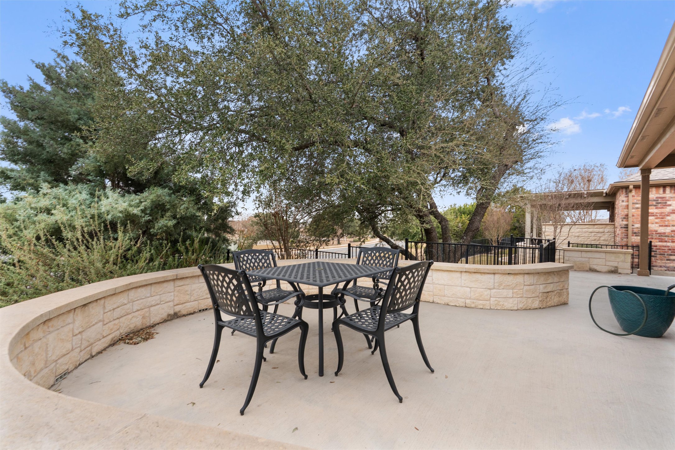 706 Kite Ridge Street Georgetown, TX 78633 - Photo 32 of 37 a view of a dining table and chairs in the patio