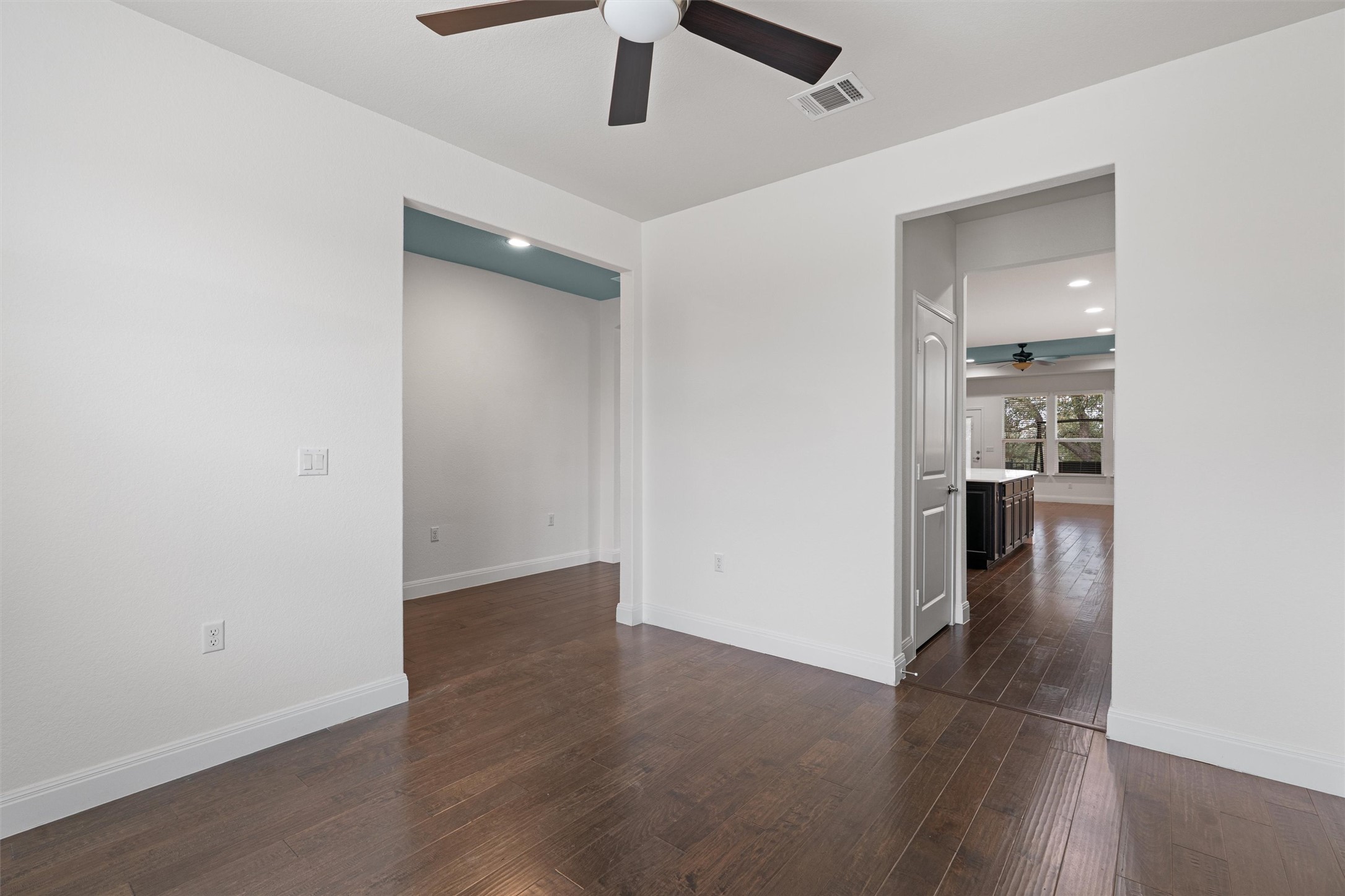 706 Kite Ridge Street Georgetown, TX 78633 - Photo 6 of 37 an empty room with wooden floor and entryway