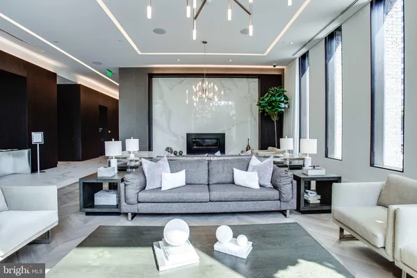 a view of swimming pool with outdoor seating