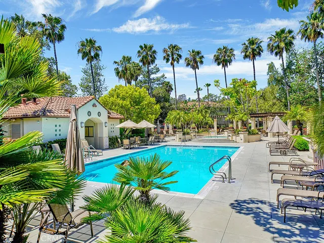 a view of a park with large trees