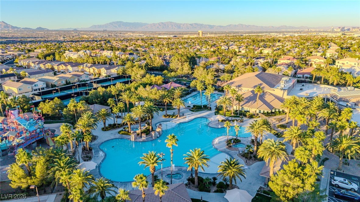 135 Broken Putter Way Las Vegas, NV 89148 - Photo 33 of 40 Aerial perspective of suburban area featuring a mountainous background