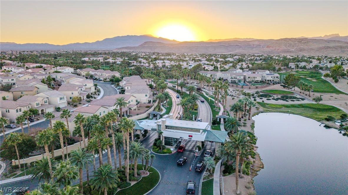 135 Broken Putter Way Las Vegas, NV 89148 - Photo 38 of 40 Aerial view at dusk of a residential view and a water and mountain view