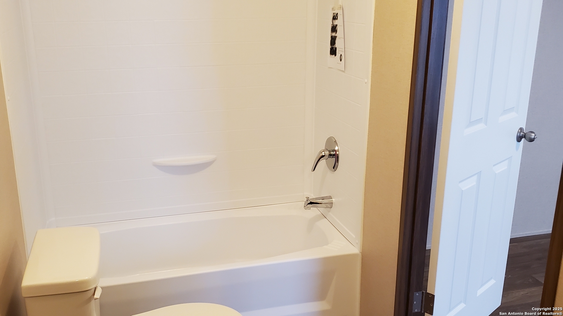 7380 Pittman Road, Unit 3 Adkins, TX 78101 - Photo 9 of 10 a bathroom with a bathtub