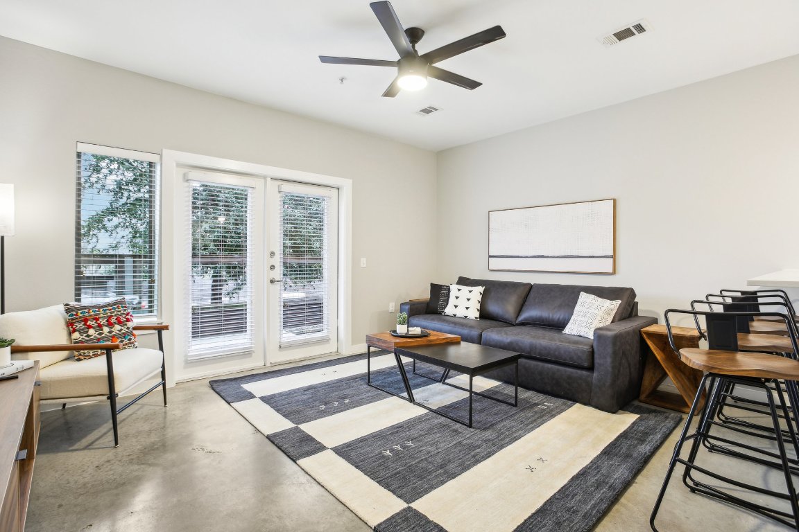 2505 Thornton Road, Unit 1107 Austin, TX 78704 - Photo 3 of 32 a living room with furniture and a window