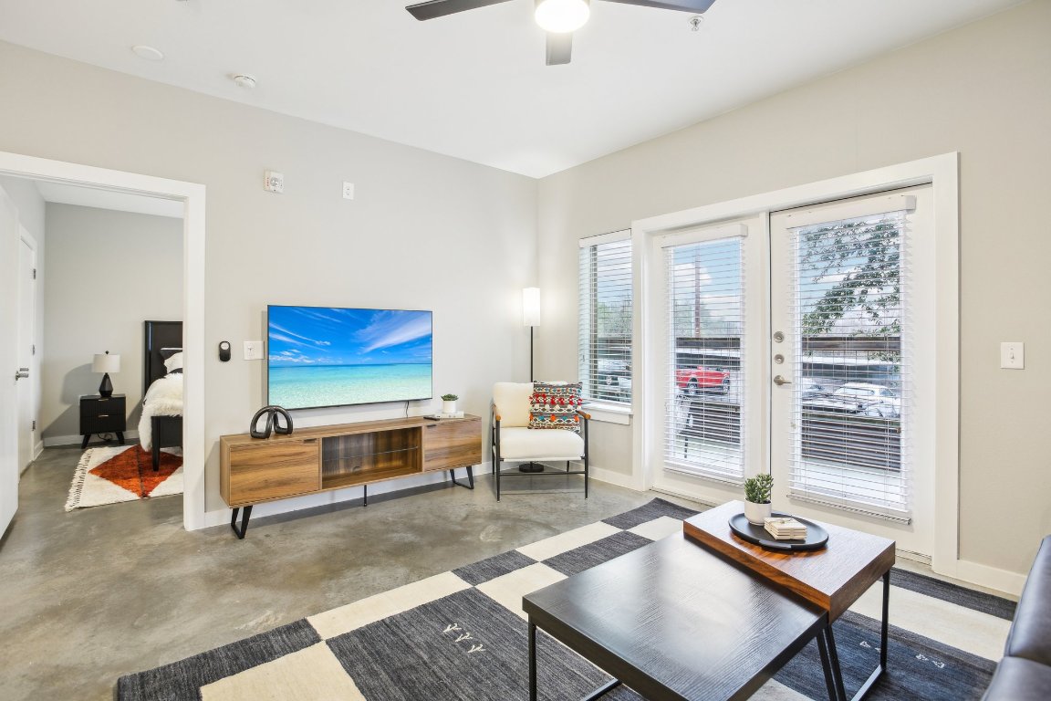 2505 Thornton Road, Unit 1107 Austin, TX 78704 - Photo 5 of 32 a living room with furniture and a window