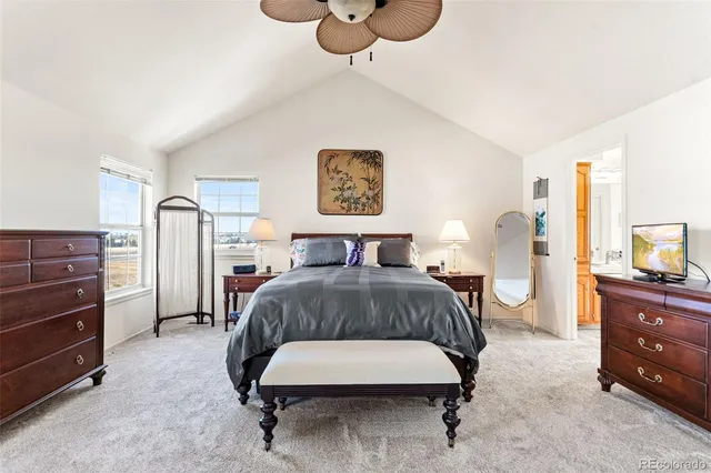 a bedroom with a bed and dresser