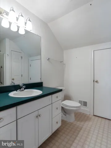 a bathroom with a shower and a tub
