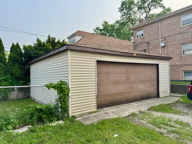 a front view of a house with a garage