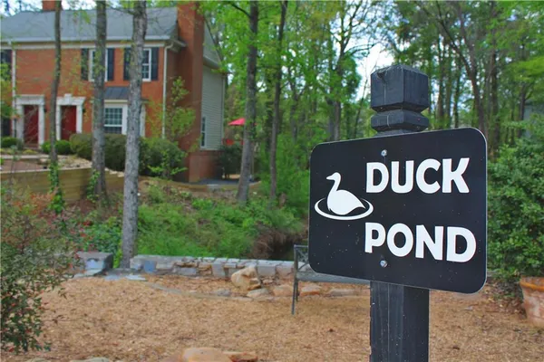 a sign broad on the side of the road
