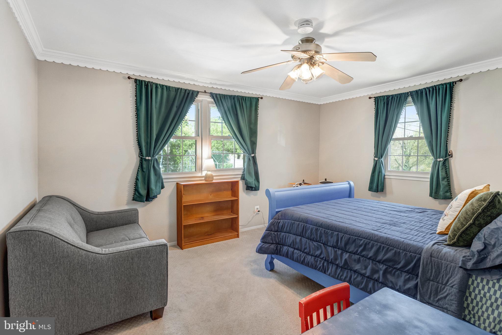 8006 Hatteras Lane Springfield, VA 22151 - Photo 11 of 31 a bed room with furniture and a window