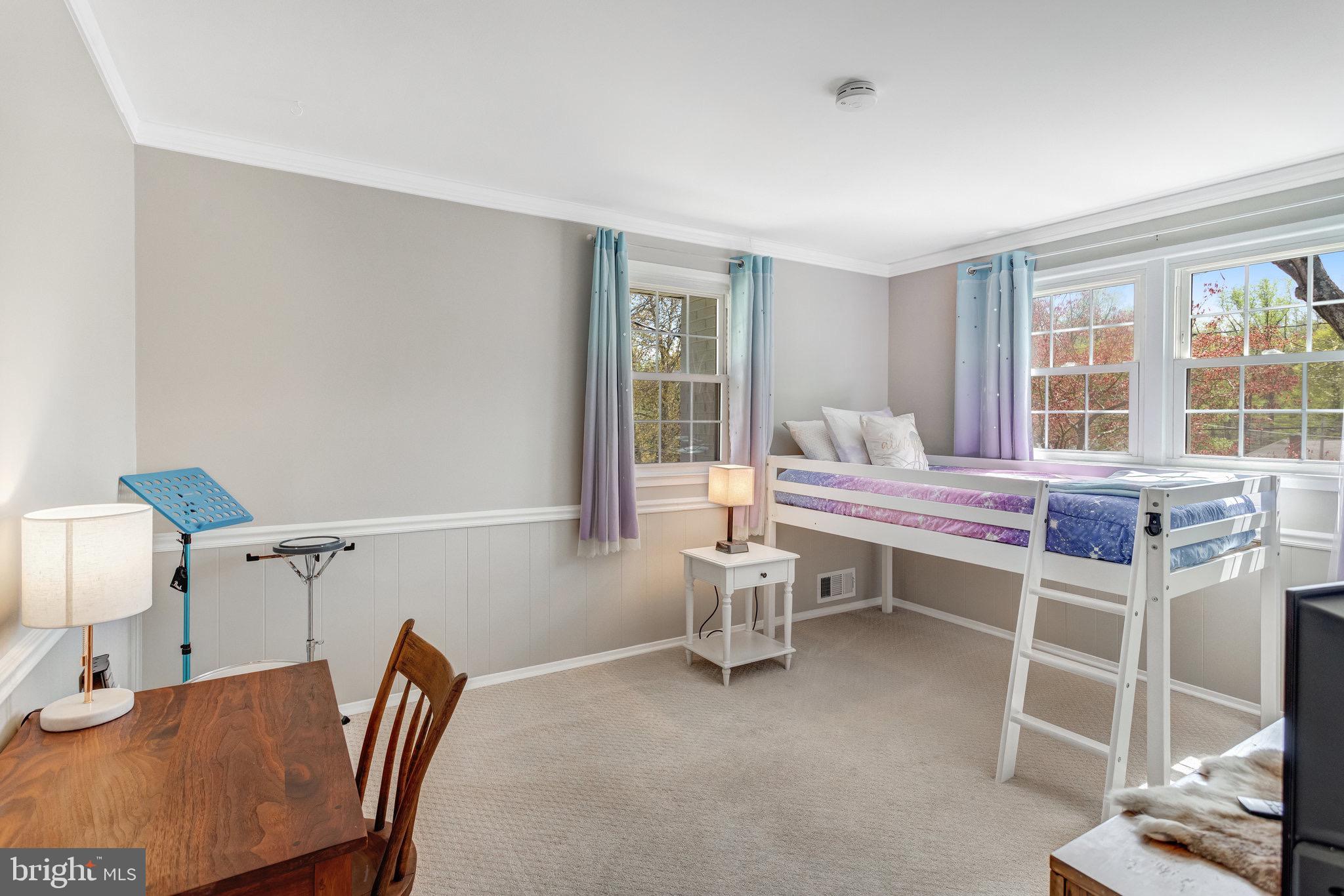 8006 Hatteras Lane Springfield, VA 22151 - Photo 12 of 31 a living room with furniture a window and a table