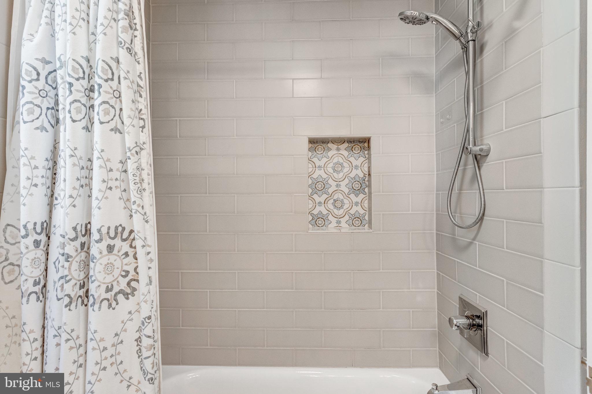 8006 Hatteras Lane Springfield, VA 22151 - Photo 15 of 31 a bathroom with a shower