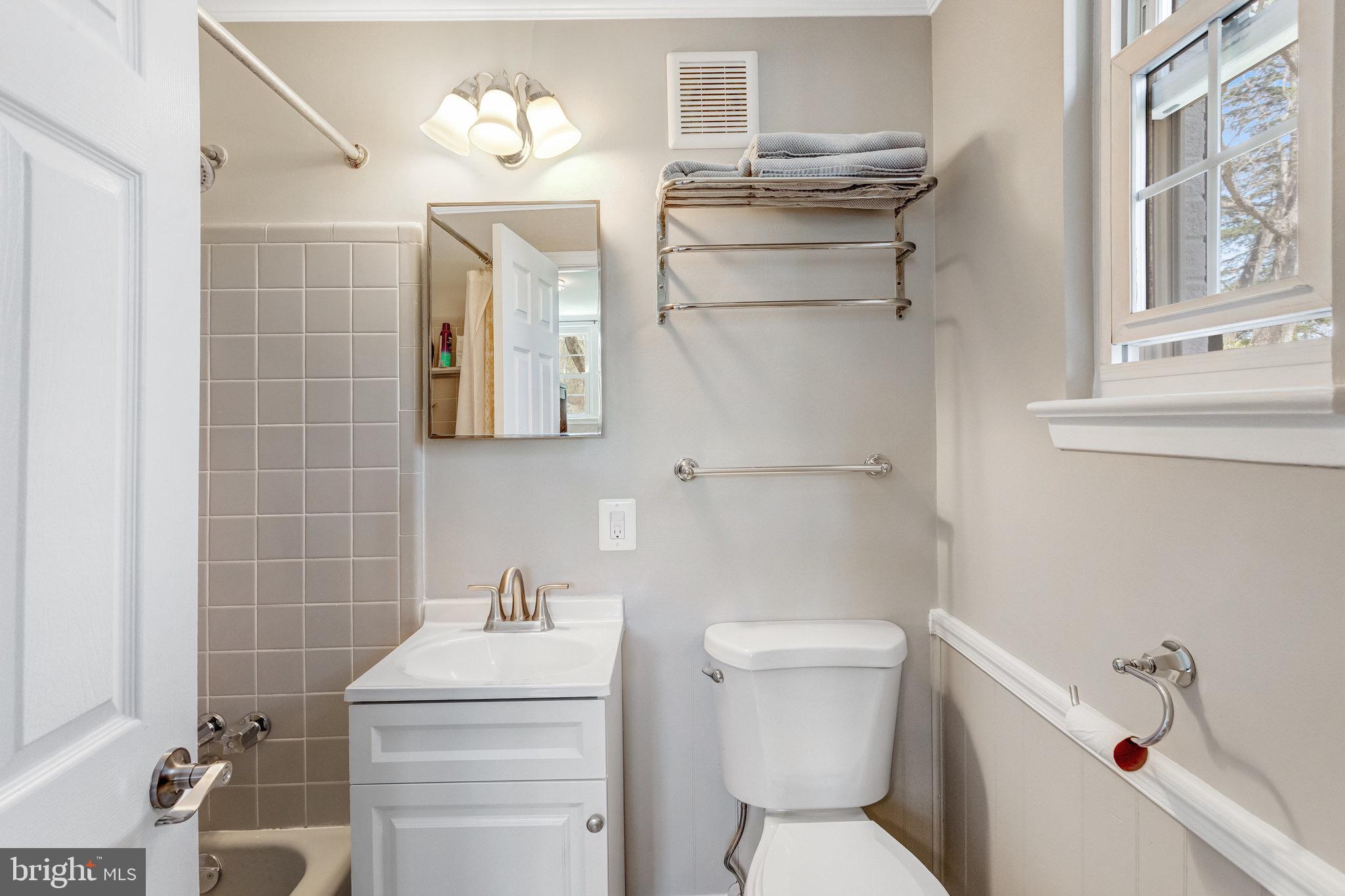 8006 Hatteras Lane Springfield, VA 22151 - Photo 18 of 31 a bathroom with a sink toilet and shower