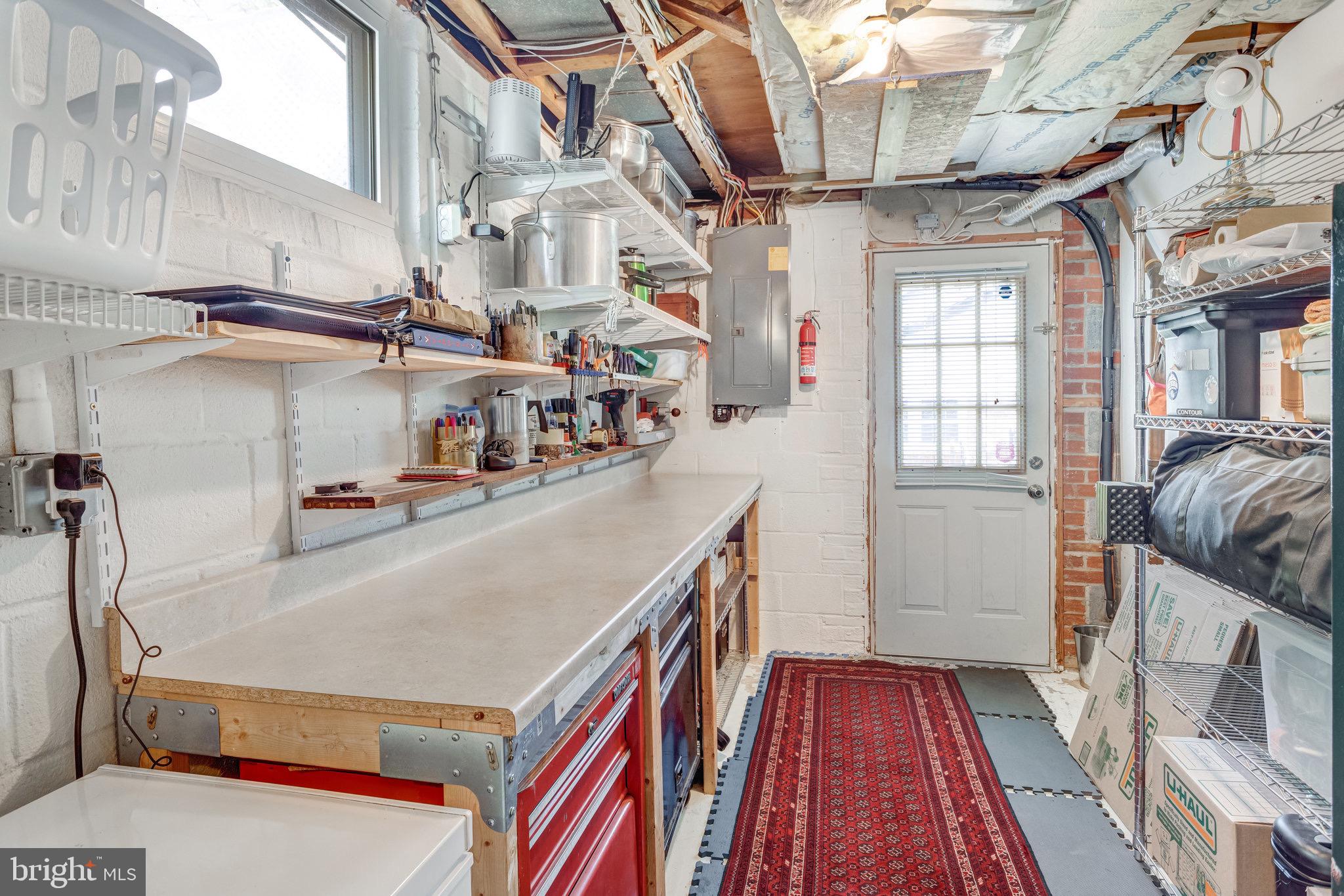 8006 Hatteras Lane Springfield, VA 22151 - Photo 19 of 31 a kitchen with stainless steel appliances granite countertop lots of counter top space