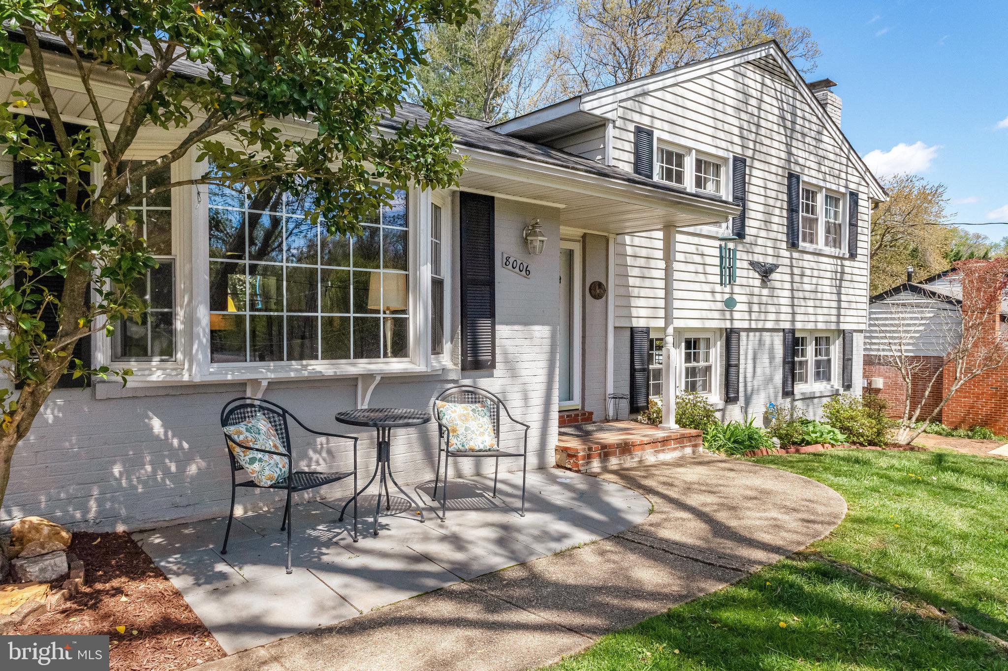 8006 Hatteras Lane Springfield, VA 22151 - Photo 2 of 31 a view of a house with backyard and sitting area