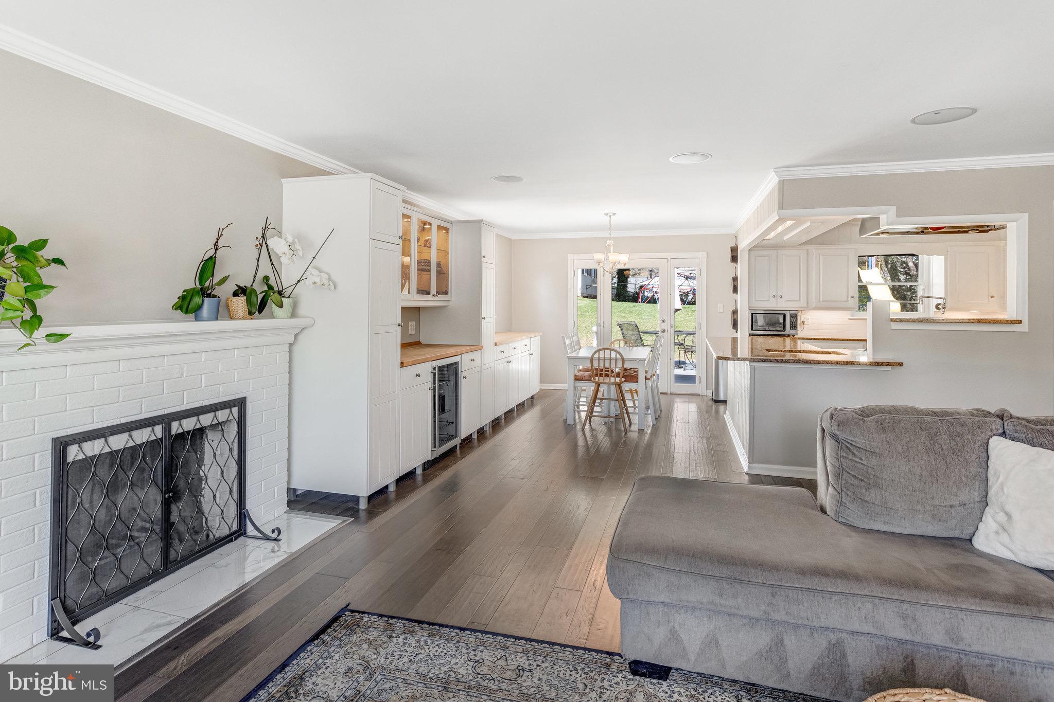 8006 Hatteras Lane Springfield, VA 22151 - Photo 5 of 31 a living room with furniture and a fireplace