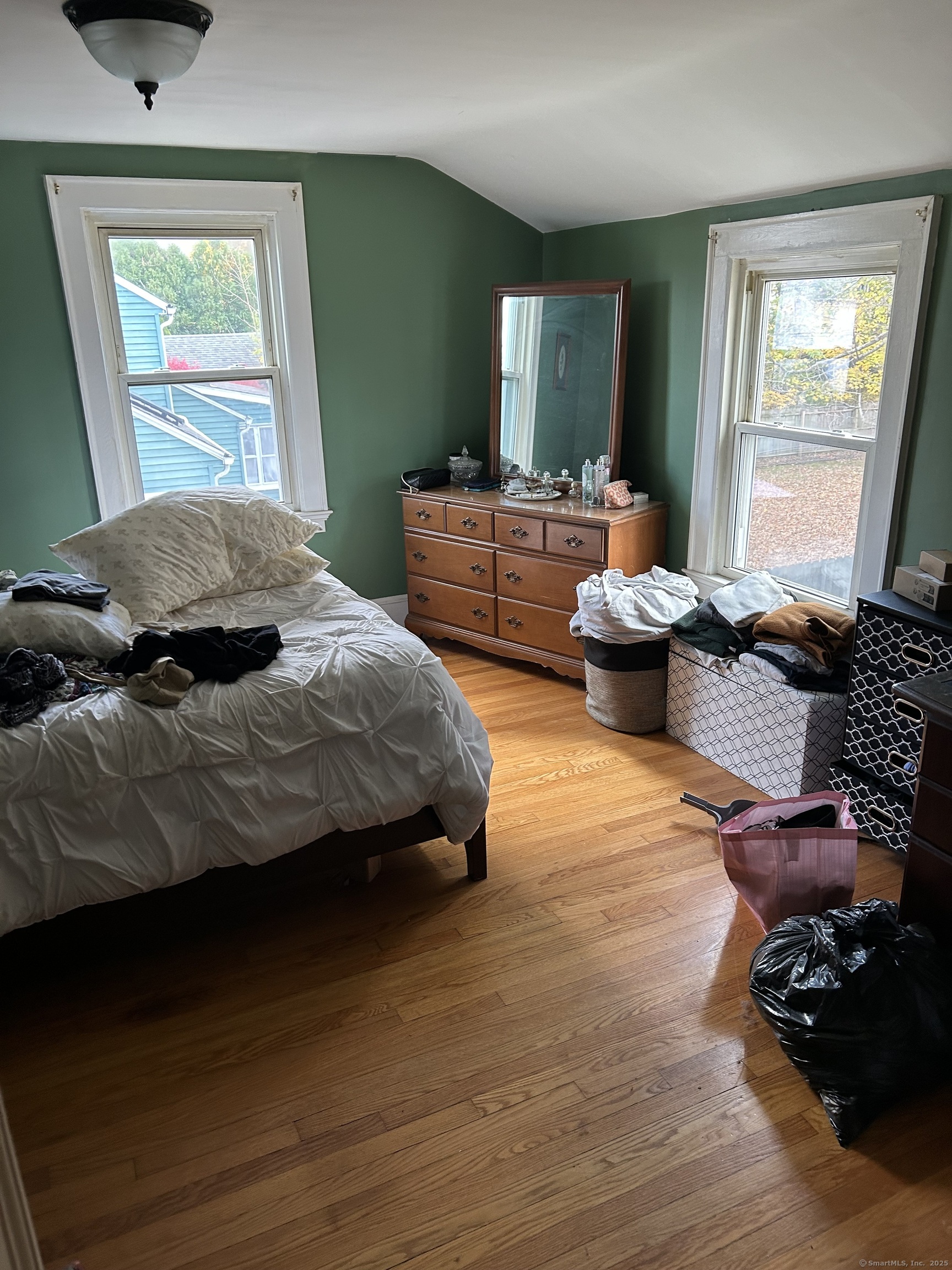 301 Wall Street Meriden, CT 06450 - Photo 15 of 20 a bedroom with furniture and a window