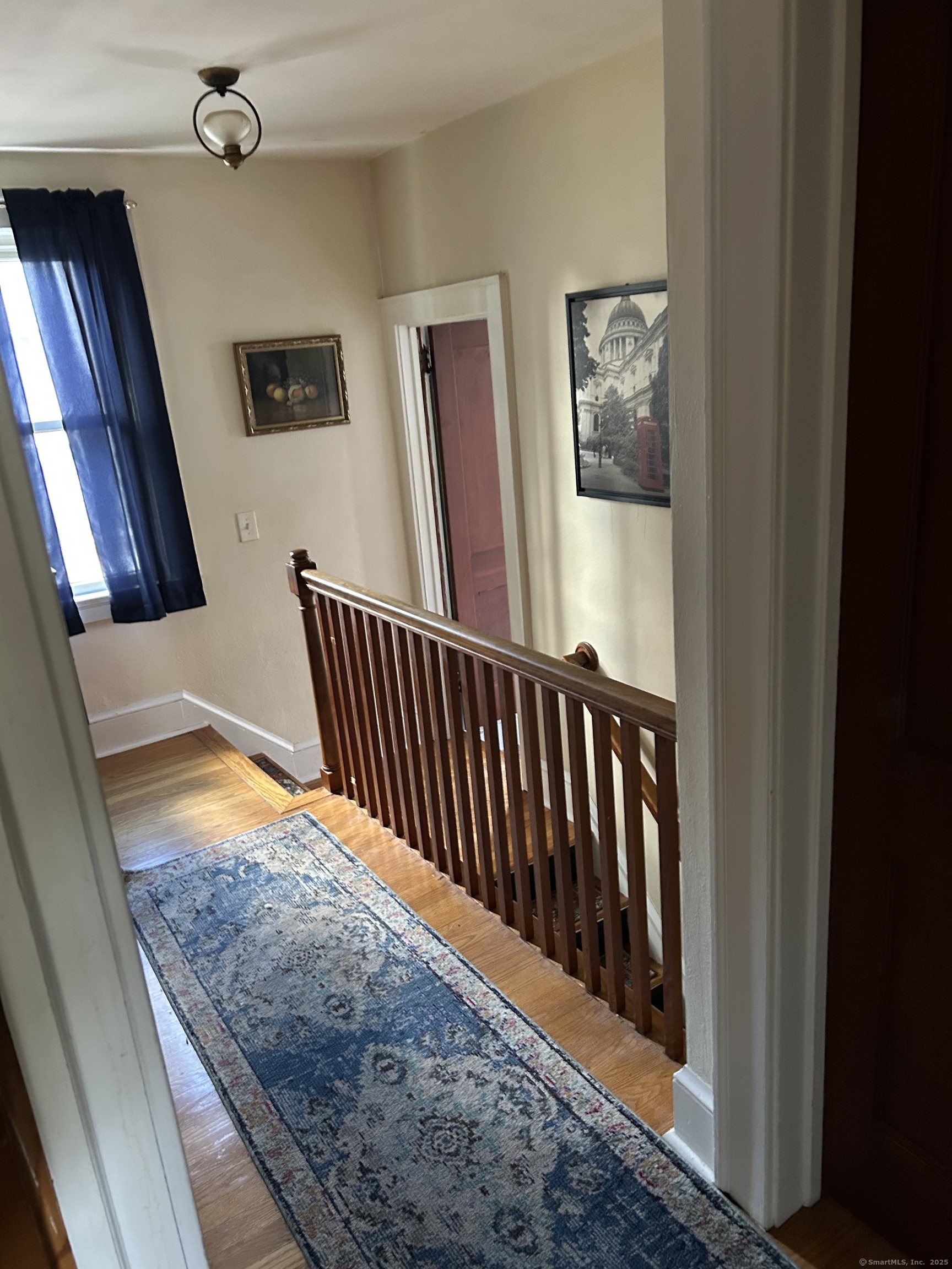 301 Wall Street Meriden, CT 06450 - Photo 20 of 20 a view of staircase with railing and a rug