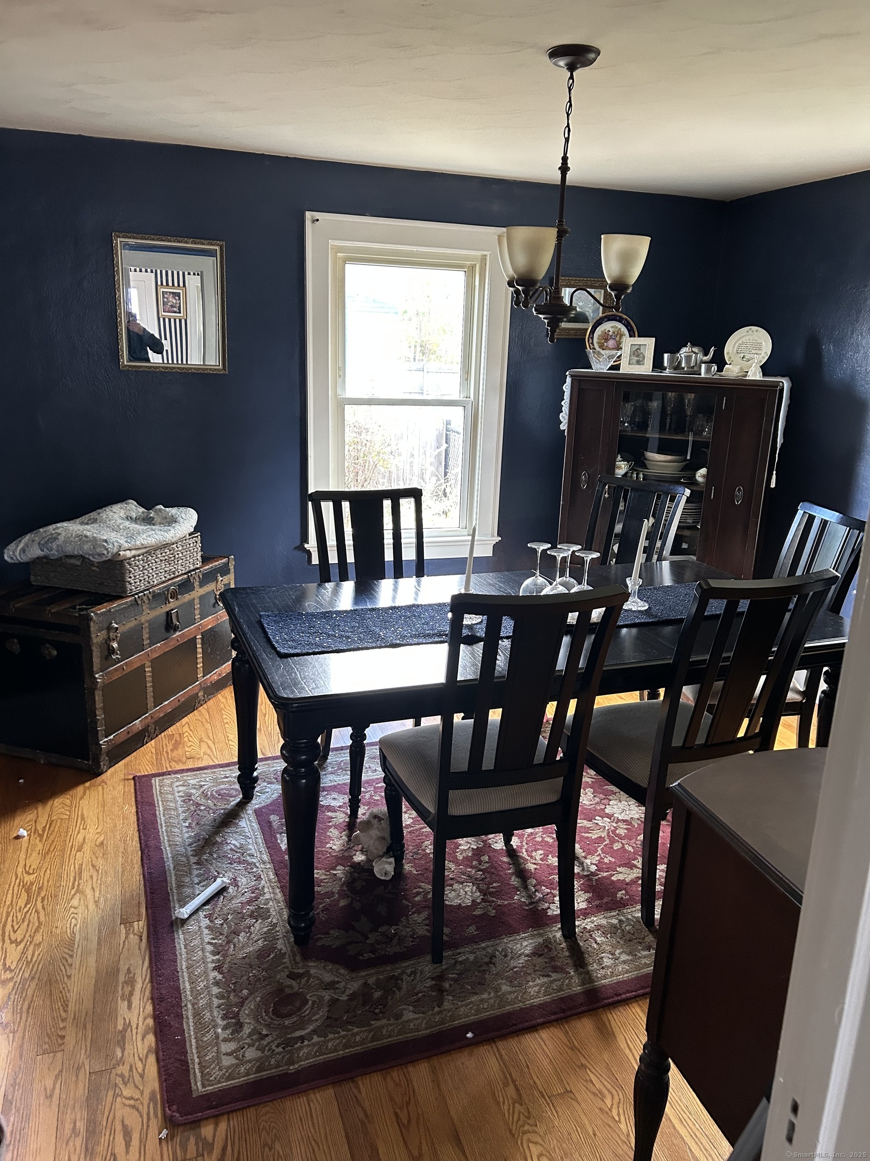 301 Wall Street Meriden, CT 06450 - Photo 7 of 20 a view of a dining room with furniture window and wooden floor