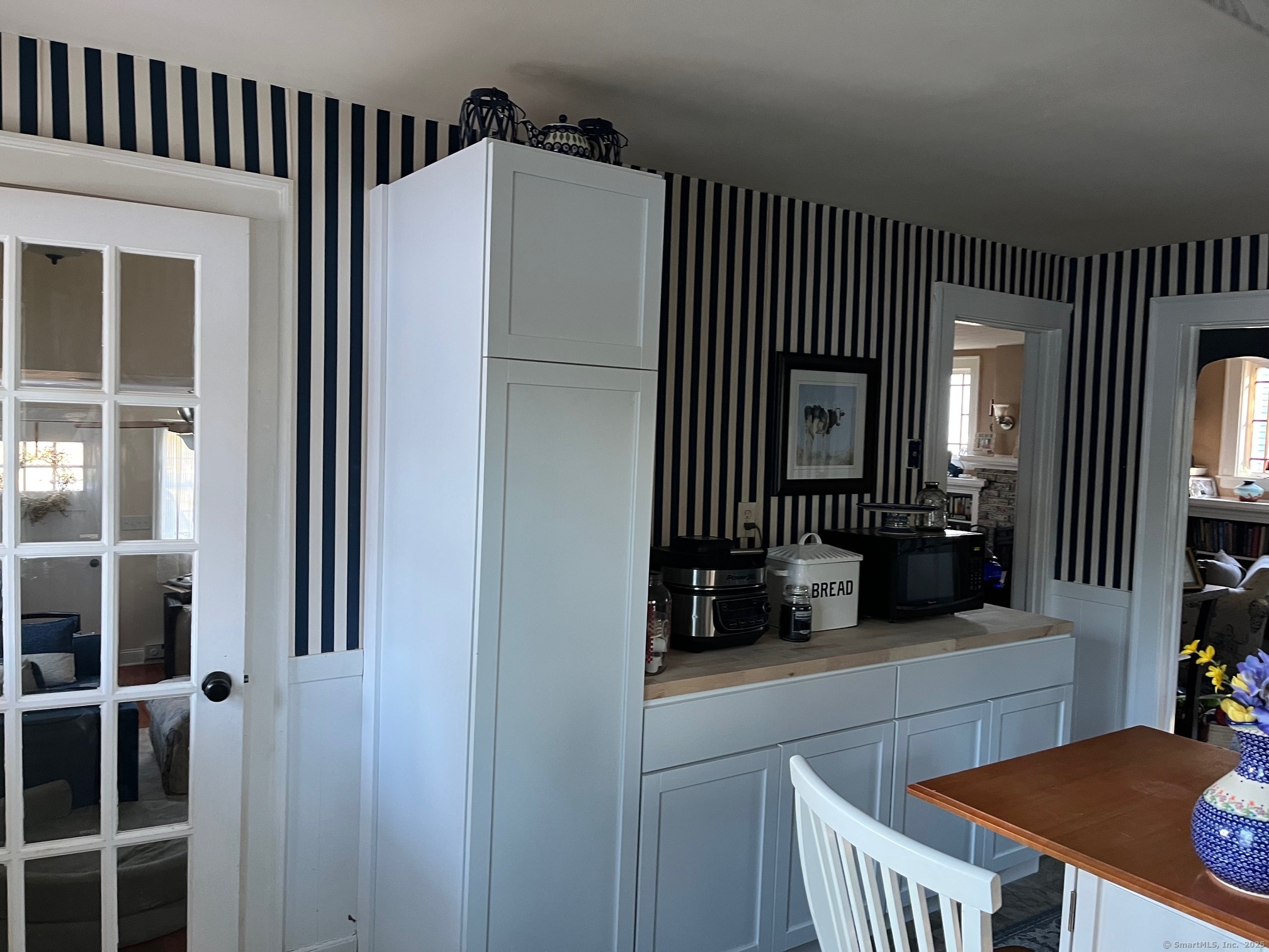 301 Wall Street Meriden, CT 06450 - Photo 9 of 20 a kitchen with a refrigerator and a sink