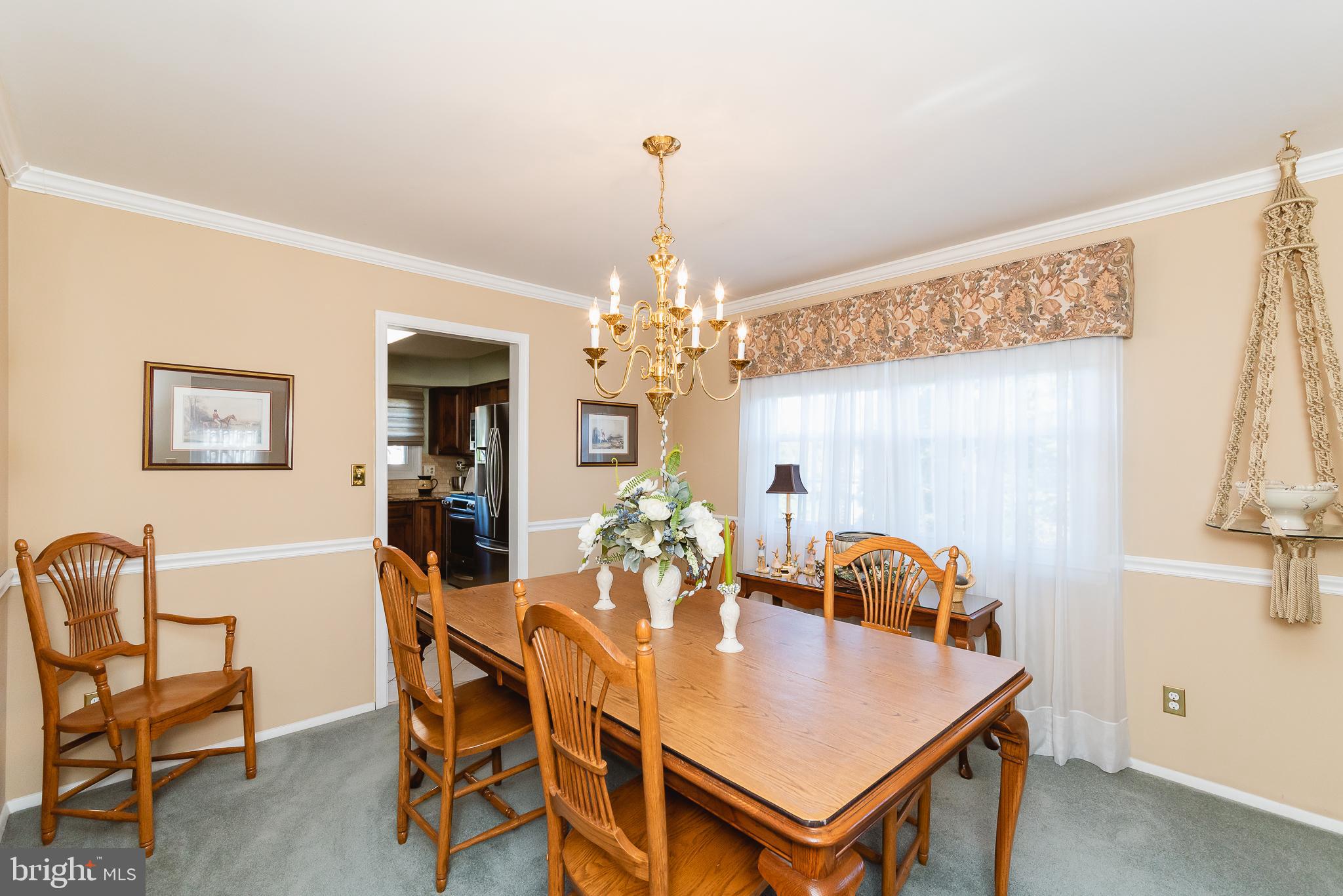 8633 Delegge Road Baltimore, MD 21237 - Photo 20 of 58 Dining Room (hardwood floors under carpet)