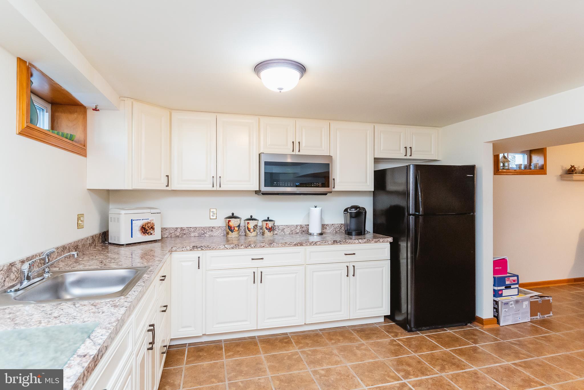 8633 Delegge Road Baltimore, MD 21237 - Photo 54 of 58 Built-in cabinets, great in-law situation