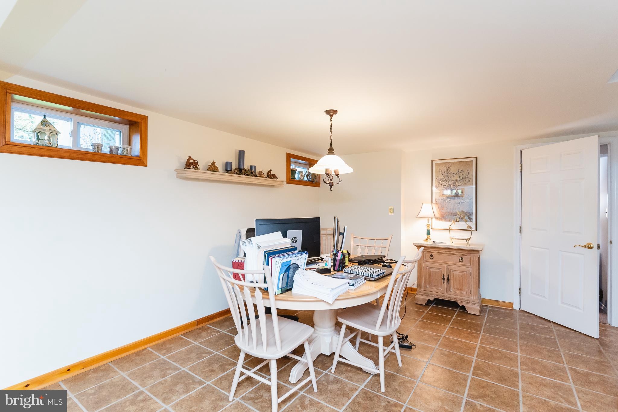 8633 Delegge Road Baltimore, MD 21237 - Photo 56 of 58 Dining area in the lower level