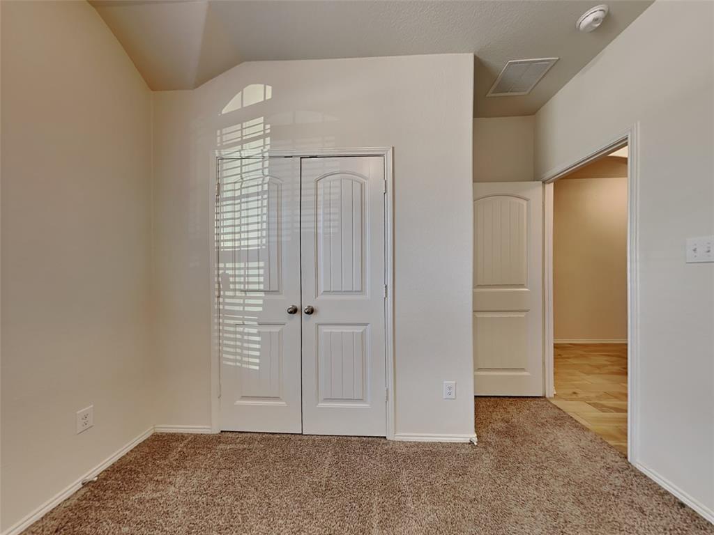 253 Pitt Circle Fate, TX 75189 - Photo 13 of 22 an empty room with closet area